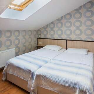 Гостиница Русское подворье Ростов Двухместный Мансардный первой категории с раздельными кроватями-1